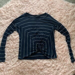 Navy and white knit sweater top with knot accent